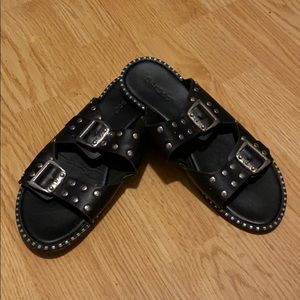 Black studded slip-on sandals